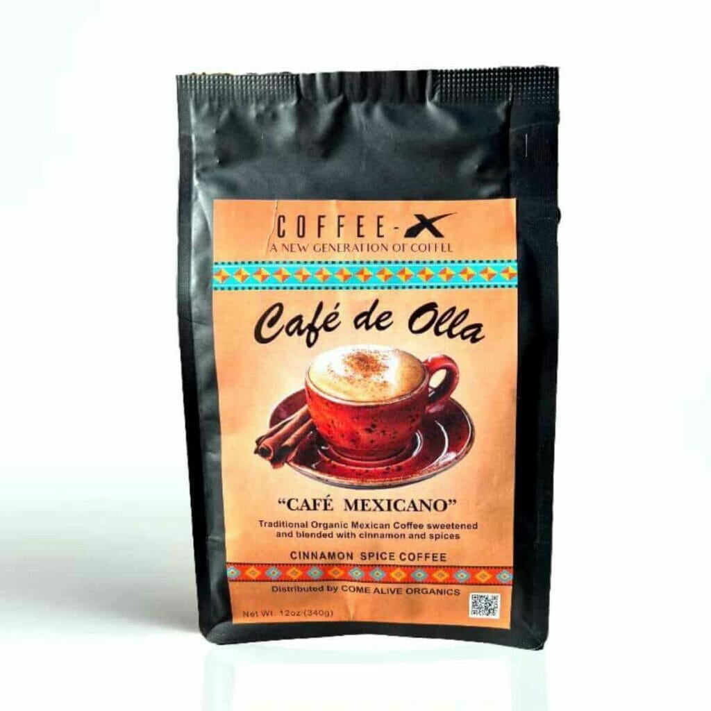 Photo of a black package with a brown stamp with a cup of coffee on it. Come Alive Organics - Cafe De Olla Mexican Coffee