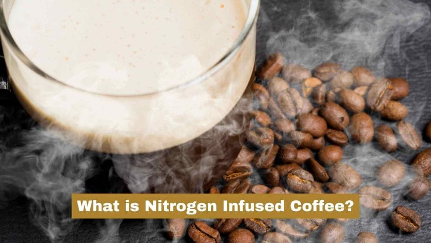 Photo of nitrogen infused coffee, coffee beans by its side and nitrogen smoke around it. What is Nitrogen Infused Coffee?