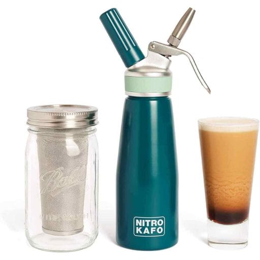 Photo of a blue Nitro KAFO Cold Brew Coffee Maker Kit with a nitro col brew coffe by its side.
